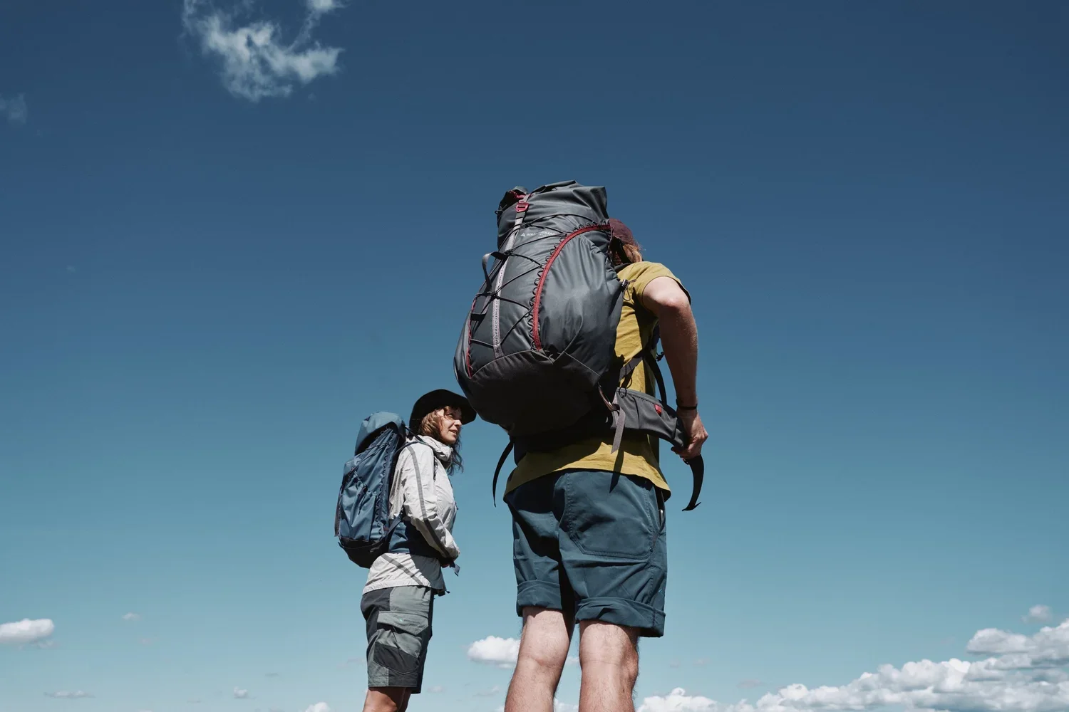 Klättermusen hikers in a mountain landscape